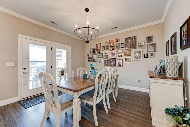 231 Winchester Dr, Rossville, GA 30741 - dining room featuring a chandelier, baseboards, dark wood-style floors, and ornamental molding