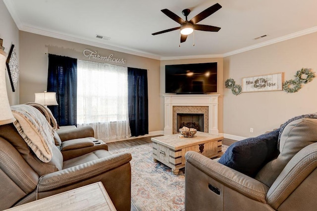 231 Winchester Dr, Rossville, GA 30741 - living area with a ceiling fan, crown molding, wood finished floors, a fireplace, and baseboards