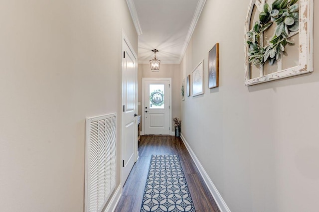 231 Winchester Dr, Rossville, GA 30741 - entryway featuring dark wood finished floors, crown molding, and baseboards