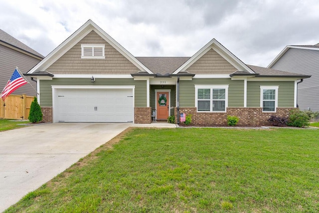 231 Winchester Dr, Rossville, GA 30741 - craftsman-style house featuring driveway, a garage, and brick siding