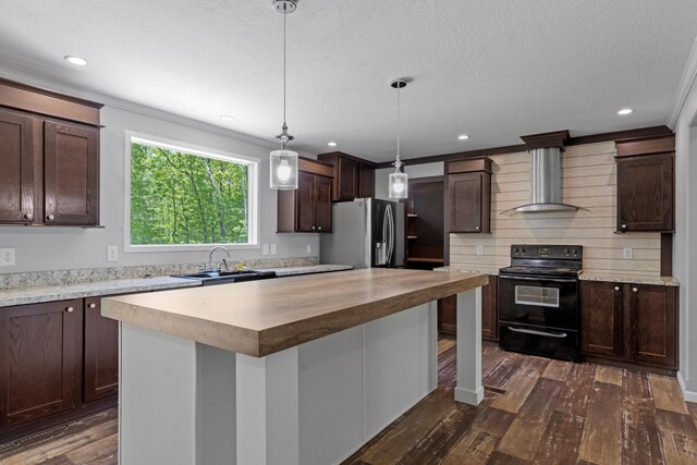 201 County Line Rd, Signal Mountain, TN 37377 - kitchen with black range with electric cooktop, wall chimney exhaust hood, stainless steel fridge with ice dispenser, dark brown cabinets, and butcher block counters