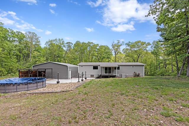 201 County Line Rd, Signal Mountain, TN 37377 - back of property with a lawn and a covered pool