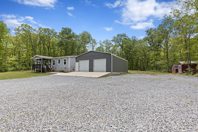 201 County Line Rd, Signal Mountain, TN 37377 - view of front of property featuring an outdoor structure, driveway, and crawl space