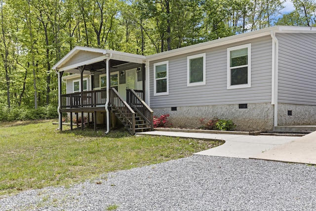 201 County Line Rd, Signal Mountain, TN 37377 - manufactured / mobile home featuring crawl space, a front lawn, ceiling fan, and stairway