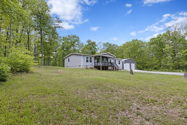 201 County Line Rd, Signal Mountain, TN 37377 - view of front facade with a garage, crawl space, a front yard, and an outdoor structure