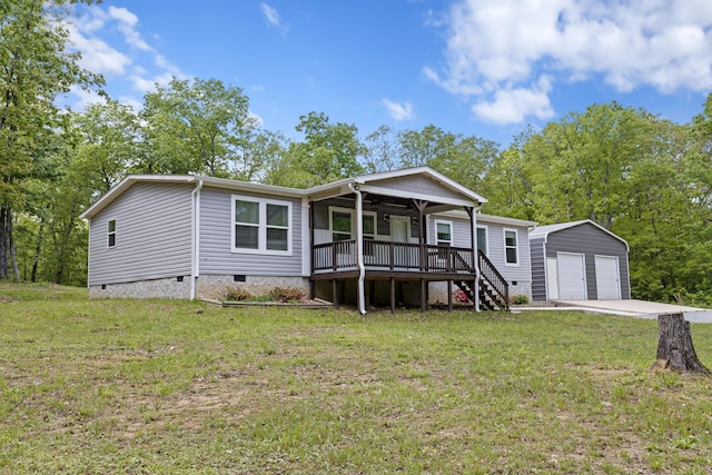 201 County Line Rd, Signal Mountain, TN 37377 - manufactured / mobile home with crawl space, an outbuilding, a garage, and a front lawn