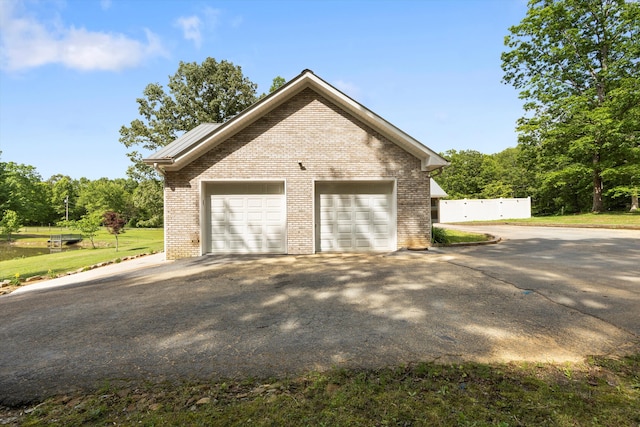 view of property exterior with brick siding