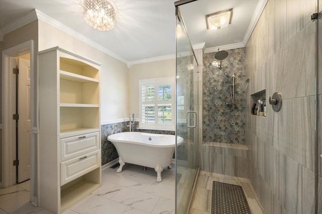 bathroom featuring a stall shower, crown molding, a freestanding bath, a chandelier, and marble look tile flooring