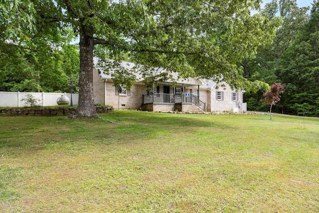 view of yard with a porch