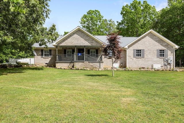 single story home with covered porch, a front lawn, and crawl space
