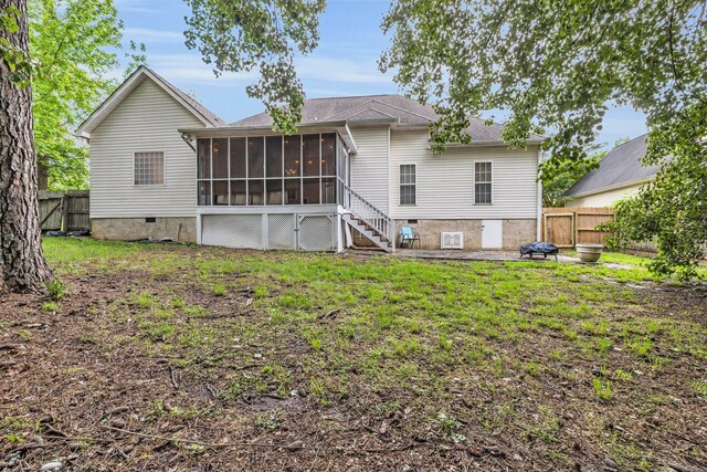 2123 Sargent Quick Dr, Chattanooga, TN 37421 - back of house with a sunroom, a fenced backyard, and stairway
