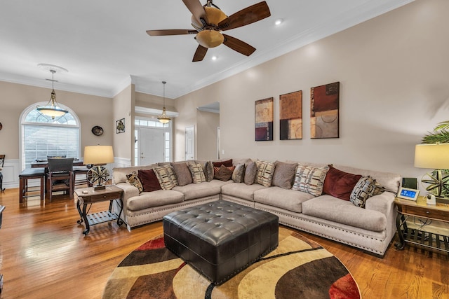 2123 Sargent Quick Dr, Chattanooga, TN 37421 - living room featuring wood finished floors, a ceiling fan, crown molding, recessed lighting, and a wainscoted wall