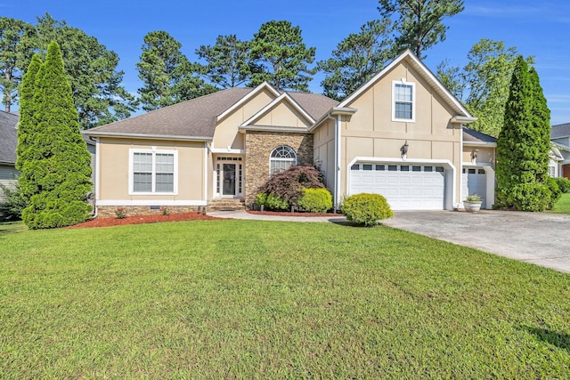 2123 Sargent Quick Dr, Chattanooga, TN 37421 - view of front of house featuring stucco siding, concrete driveway, and a front yard