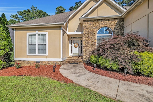 2123 Sargent Quick Dr, Chattanooga, TN 37421 - view of front of home featuring stucco siding, stone siding, and a shingled roof