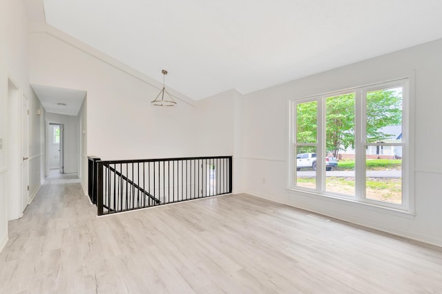 3910 Brock Rd, Chattanooga, TN 37421 - spare room featuring light wood finished floors and high vaulted ceiling