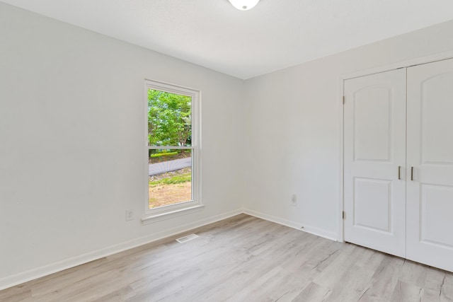 3910 Brock Rd, Chattanooga, TN 37421 - unfurnished bedroom featuring light wood-style floors and a closet