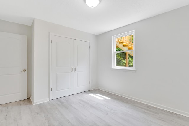 3910 Brock Rd, Chattanooga, TN 37421 - unfurnished bedroom featuring light wood finished floors and a closet