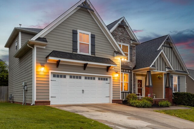 8802 Mckenzie Farm Dr, Ooltewah, TN 37363 - craftsman-style house with an attached garage, concrete driveway, a front lawn, and roof with shingles