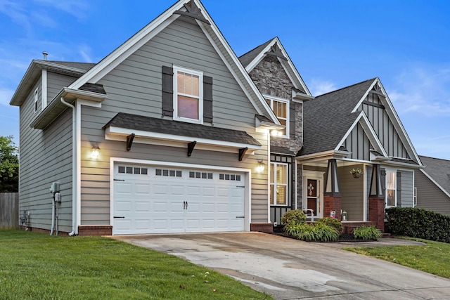 8802 Mckenzie Farm Dr, Ooltewah, TN 37363 - view of front of property with a garage, driveway, a front lawn, and roof with shingles