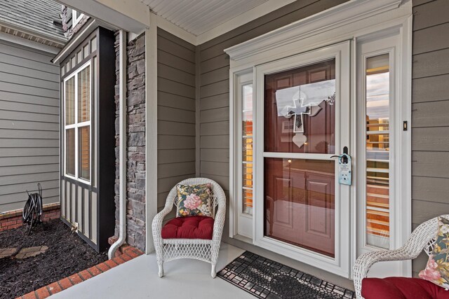 8802 Mckenzie Farm Dr, Ooltewah, TN 37363 - doorway to property featuring covered porch