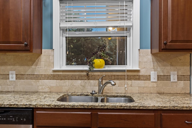 8802 Mckenzie Farm Dr, Ooltewah, TN 37363 - kitchen featuring a sink, dishwasher, decorative backsplash, and light stone counters