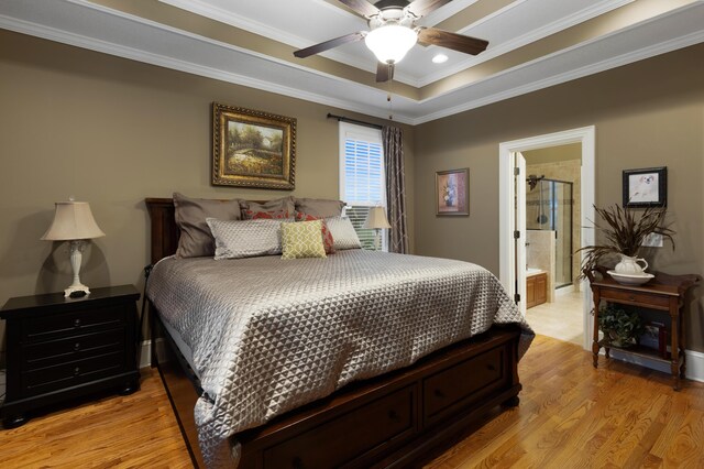 8802 Mckenzie Farm Dr, Ooltewah, TN 37363 - bedroom with light wood-style floors, ornamental molding, a raised ceiling, ensuite bathroom, and ceiling fan