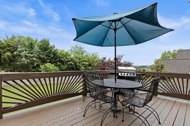 8802 Mckenzie Farm Dr, Ooltewah, TN 37363 - wooden deck with outdoor dining area and grilling area