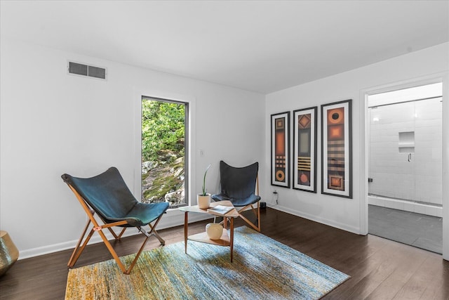 sitting room featuring wood finished floors and baseboards