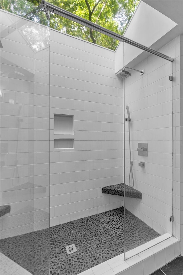 bathroom featuring a stall shower