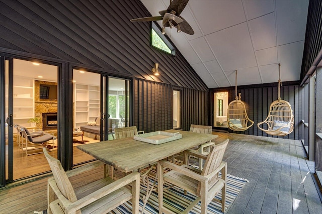 wooden terrace with a ceiling fan