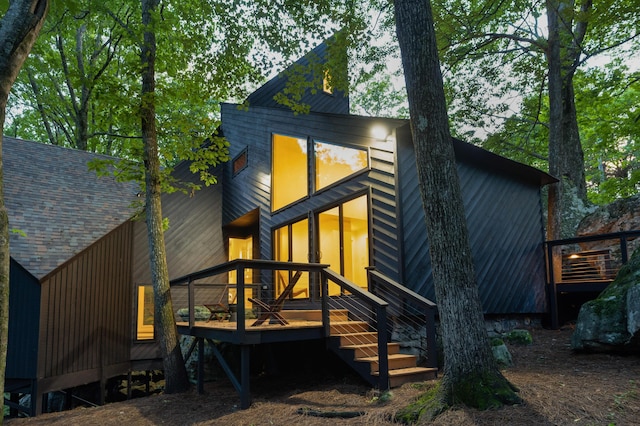 rear view of house with a deck
