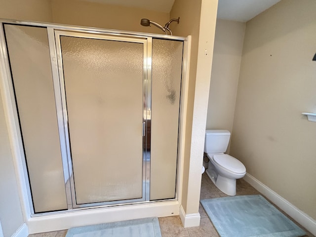 1501 Applebrook Dr, Rossville, GA 30741 - full bath with a stall shower, toilet, tile patterned flooring, and baseboards