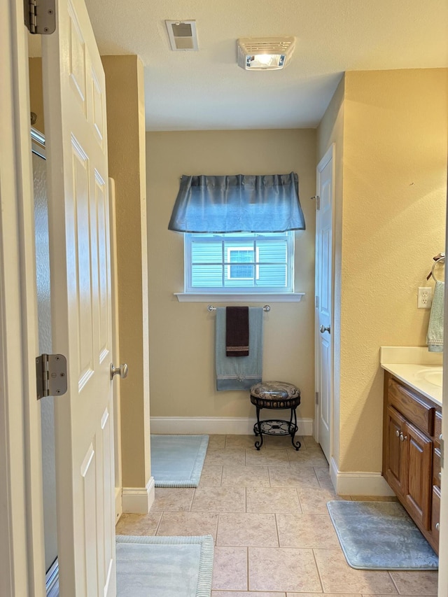1501 Applebrook Dr, Rossville, GA 30741 - bathroom featuring vanity, tile patterned flooring, and baseboards