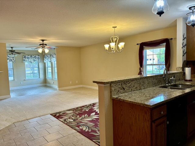 1501 Applebrook Dr, Rossville, GA 30741 - kitchen with light colored carpet, a sink, pendant lighting, and baseboards