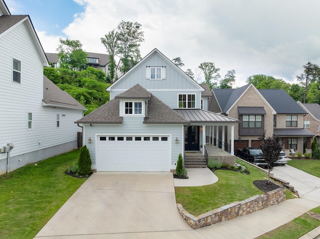 1328 Carrington Way, Chattanooga, TN 37405 - view of front of home with board and batten siding, a front yard, driveway, a porch, and a shingled roof