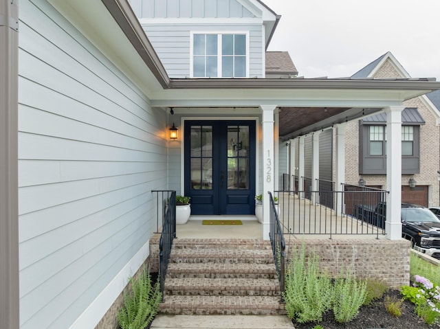 1328 Carrington Way, Chattanooga, TN 37405 - view of exterior entry featuring french doors and board and batten siding