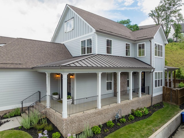 1328 Carrington Way, Chattanooga, TN 37405 - rear view of property featuring covered porch, board and batten siding, a standing seam roof, metal roof, and roof with shingles