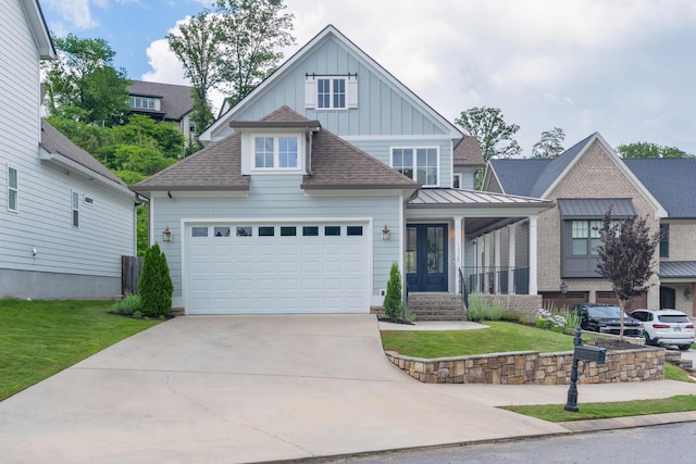 1328 Carrington Way, Chattanooga, TN 37405 - craftsman inspired home with board and batten siding, driveway, a front yard, roof with shingles, and an attached garage