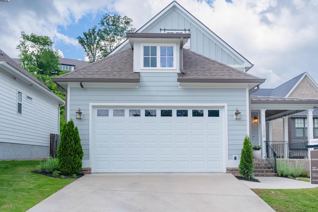 1328 Carrington Way, Chattanooga, TN 37405 - view of front of house with a shingled roof, board and batten siding, and driveway