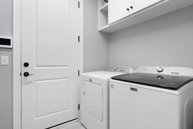 1328 Carrington Way, Chattanooga, TN 37405 - laundry area with cabinet space and separate washer and dryer