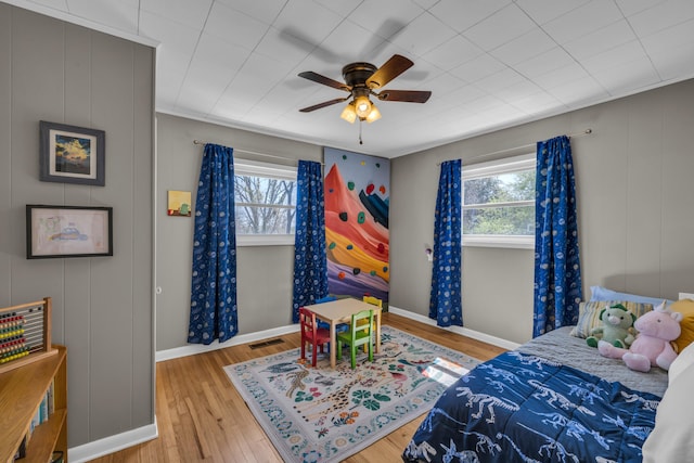 3804 Northview Ave, Chattanooga, TN 37412 - bedroom with multiple windows, wood finished floors, and baseboards