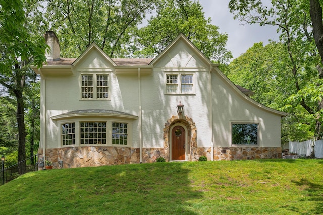 1102 Tinkerbell Ln, Lookout Mountain, GA 30750 - tudor house with a chimney, stone siding, and stucco siding
