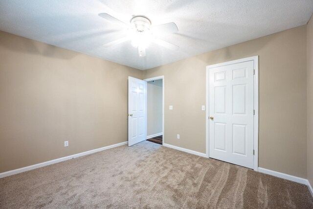 14 Castleview Ct, Ringgold, GA 30736 - unfurnished bedroom with carpet floors, baseboards, and ceiling fan
