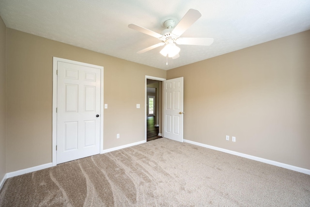 14 Castleview Ct, Ringgold, GA 30736 - unfurnished bedroom featuring carpet flooring, baseboards, and ceiling fan