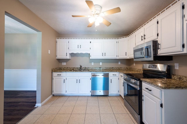 14 Castleview Ct, Ringgold, GA 30736 - kitchen featuring appliances with stainless steel finishes, a sink, ceiling fan, and white cabinets