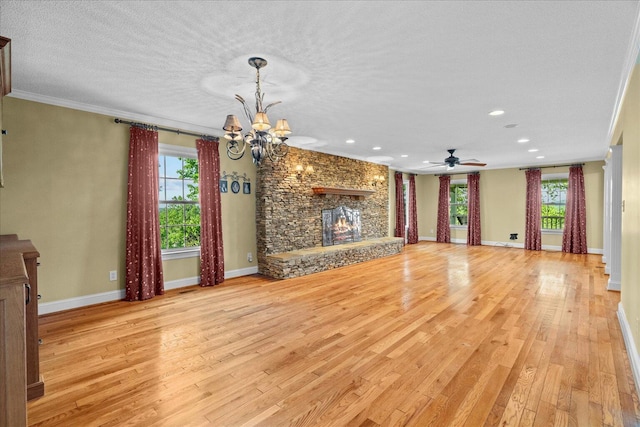 1578 Old Ringgold Rd, Rocky Face, GA 30740 - unfurnished living room featuring a chandelier, a large fireplace, light wood-style flooring, recessed lighting, and baseboards