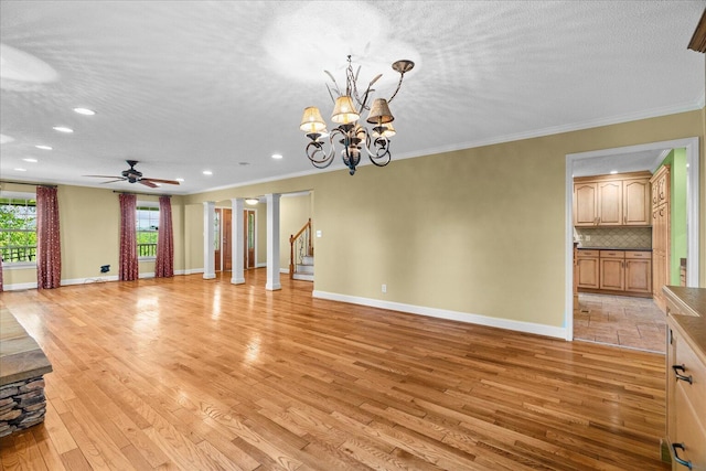 1578 Old Ringgold Rd, Rocky Face, GA 30740 - unfurnished living room with light wood-style flooring, baseboards, recessed lighting, ornamental molding, and stairs