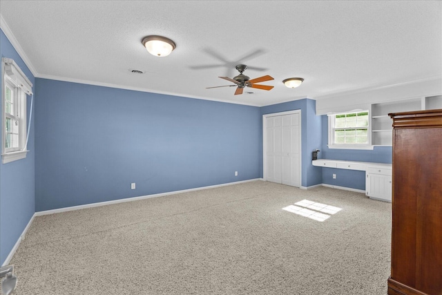 1578 Old Ringgold Rd, Rocky Face, GA 30740 - unfurnished bedroom featuring light colored carpet, crown molding, a textured ceiling, baseboards, and a ceiling fan