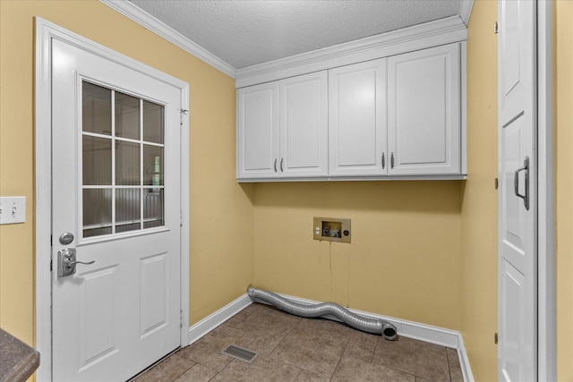 1578 Old Ringgold Rd, Rocky Face, GA 30740 - clothes washing area with baseboards, washer hookup, cabinet space, crown molding, and a textured ceiling