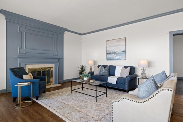 1116 Cumberland Rd, Chattanooga, TN 37419 - living room featuring wood finished floors, a fireplace with flush hearth, and crown molding